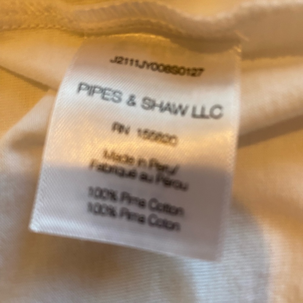 White shirt with a tie around neck never worn